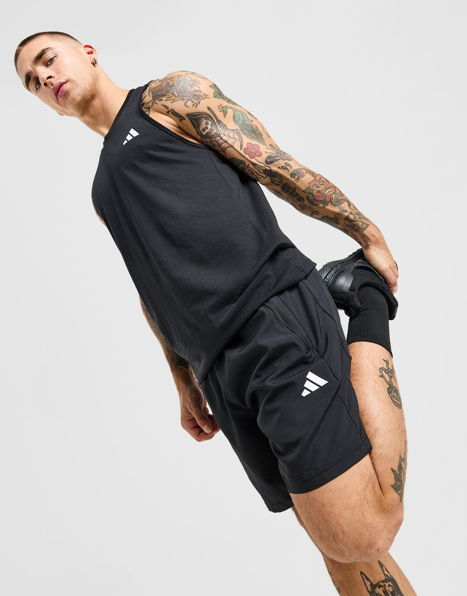 adidas Short d'entraînement en toile Train Essentials