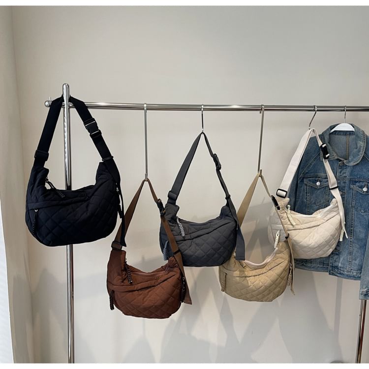 Hikuozy - Gewatteerde nylon crossbodytas met rits