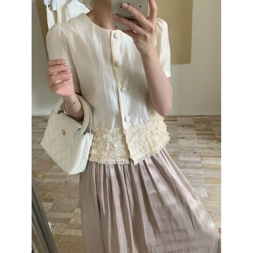 ISSOL - Mouwloze blouse met ronde hals en effen volant