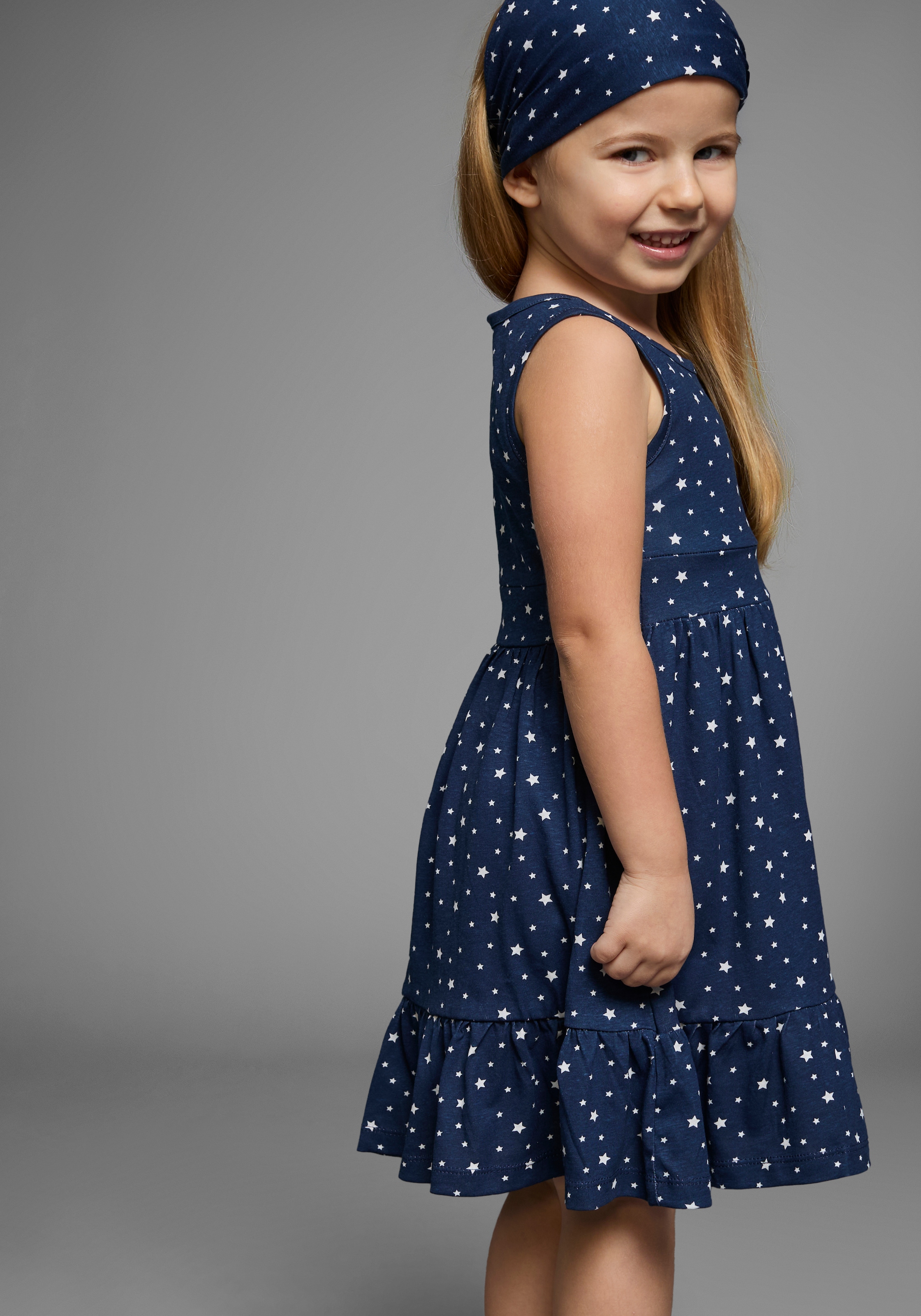 KIDSWORLD Jerseykleid »2tlg. Shirtkleid + Haarband im niedlichen Sternen-Allover« Set, 2 Stk. tlg. festliche Anlässe,  knielang,  verspielter Stil,  aus Baumwolle