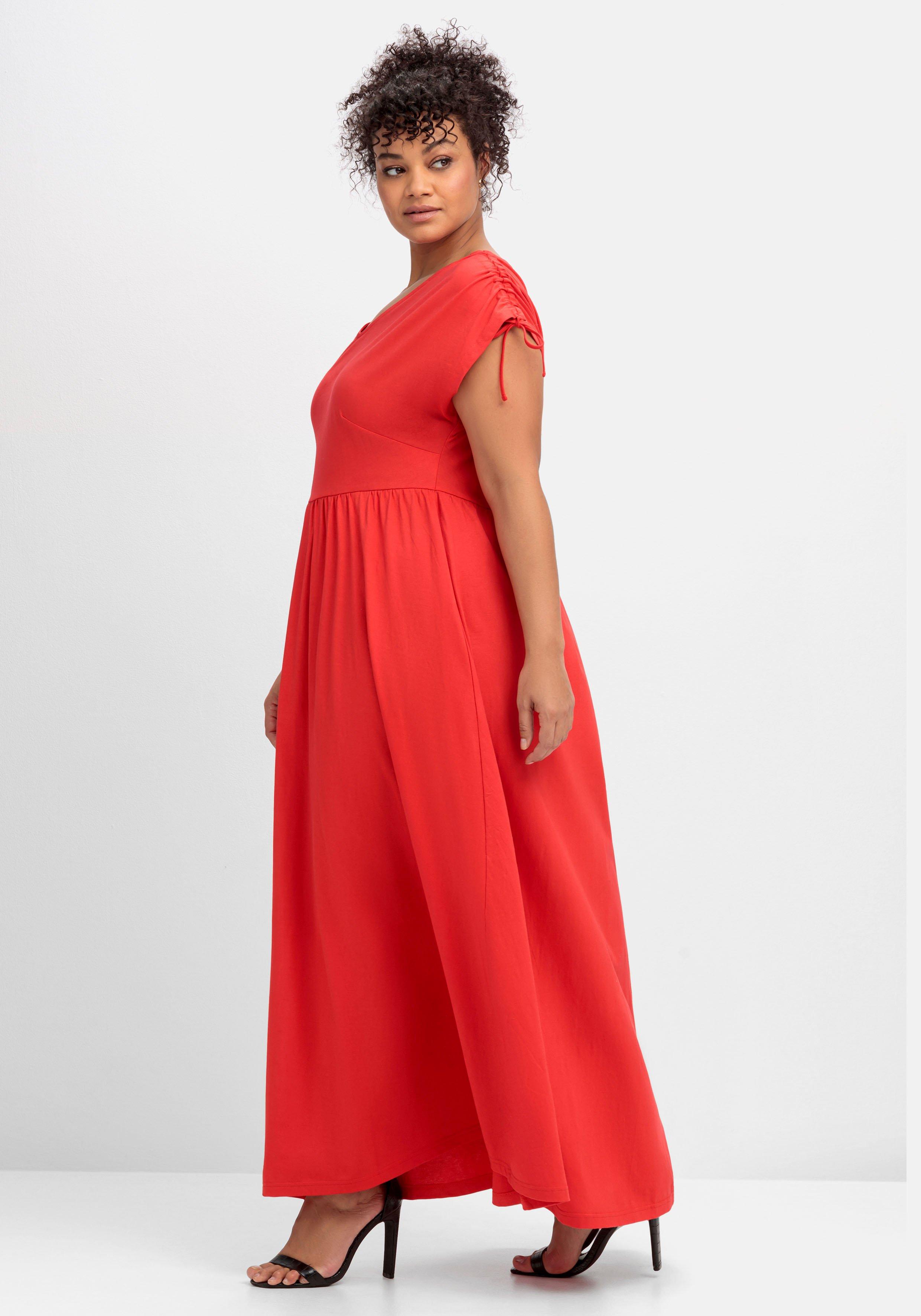 Jerseykleid mit weitem Rock und V-Ausschnitt