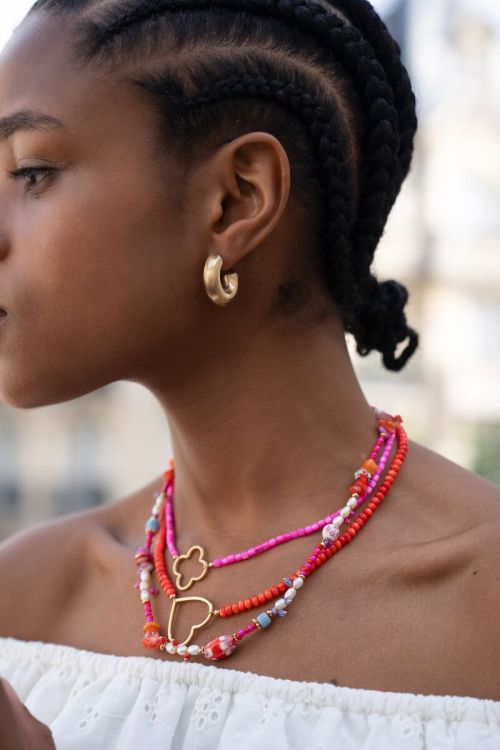 Roze kralen ketting met klaver