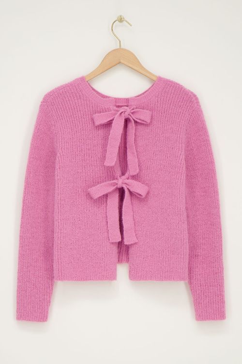 Roze gebreide trui met strikken