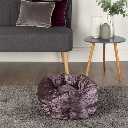 Cama roxa em formato de donut para animais de estimação