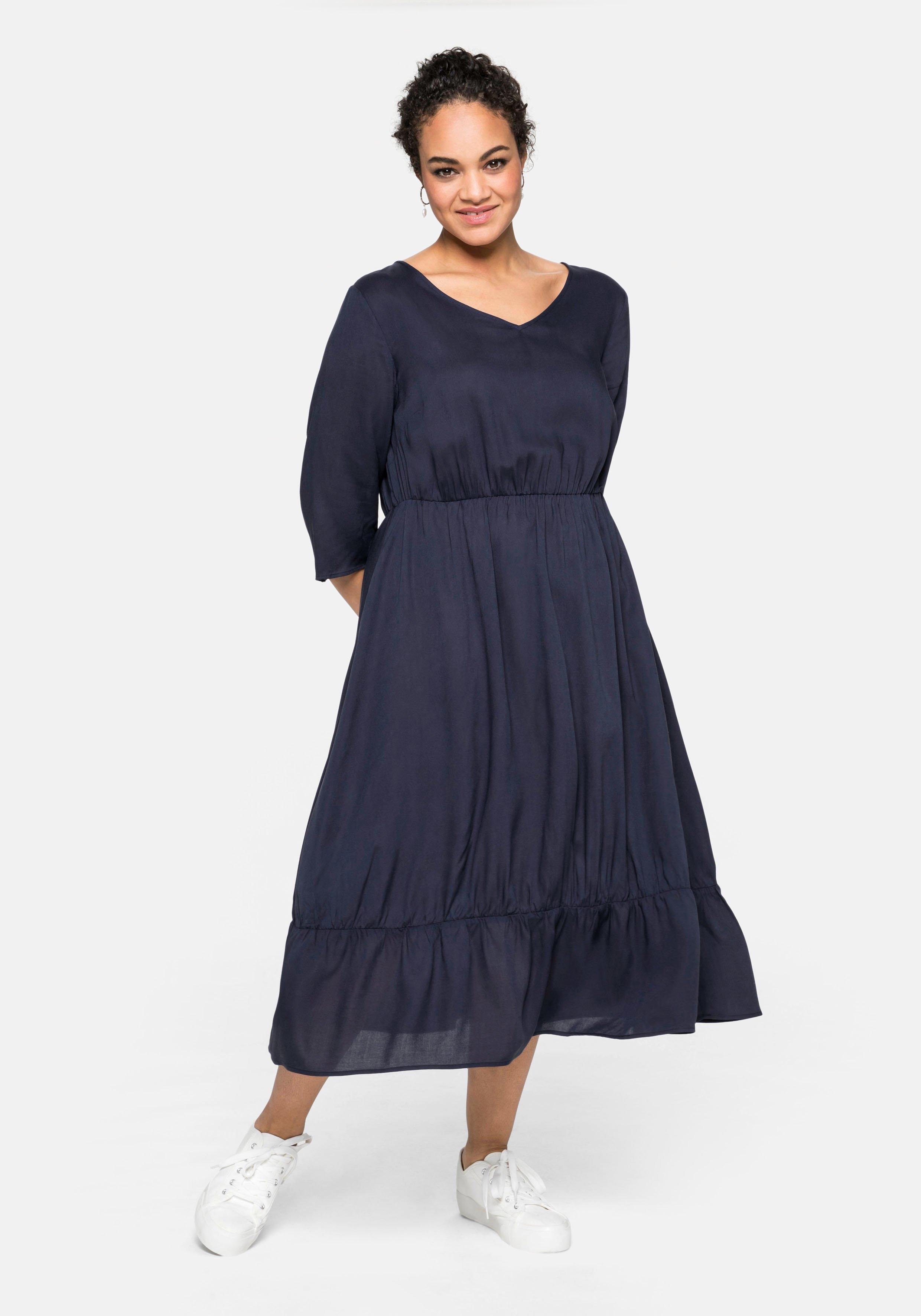 Kleid mit 3/4-Ärmel und Volant am Saum