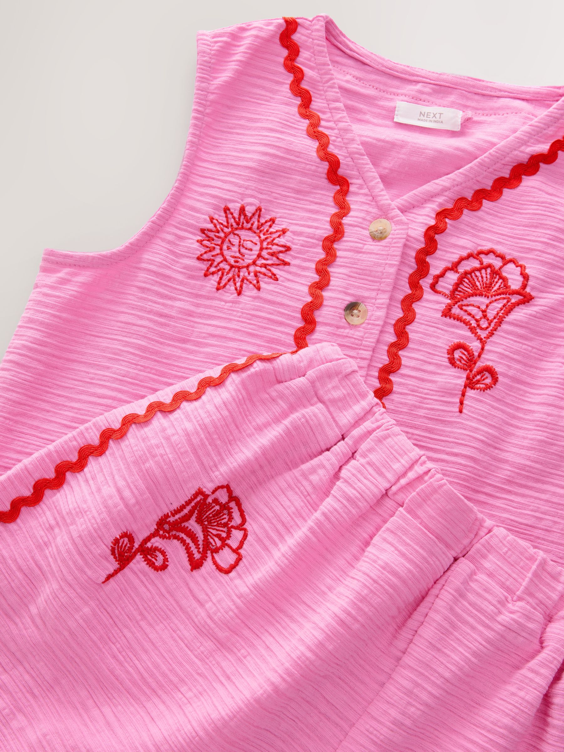 Roze - Geborduurde gilet- en shortset (3-16jr)