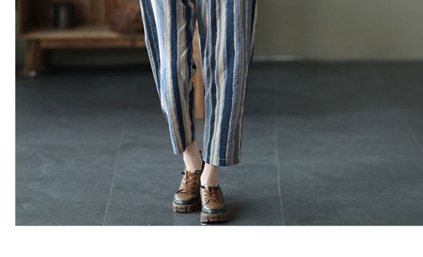ZIMO - Gestreepte cropped taps toelopende broek met trekkoordtaille