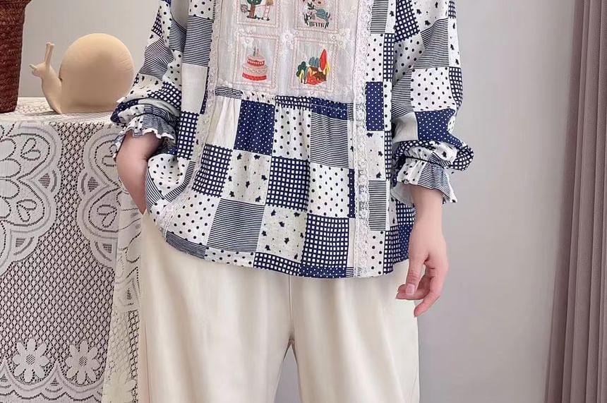 Aigan - Blouse met pofmouwen en kantversiering
