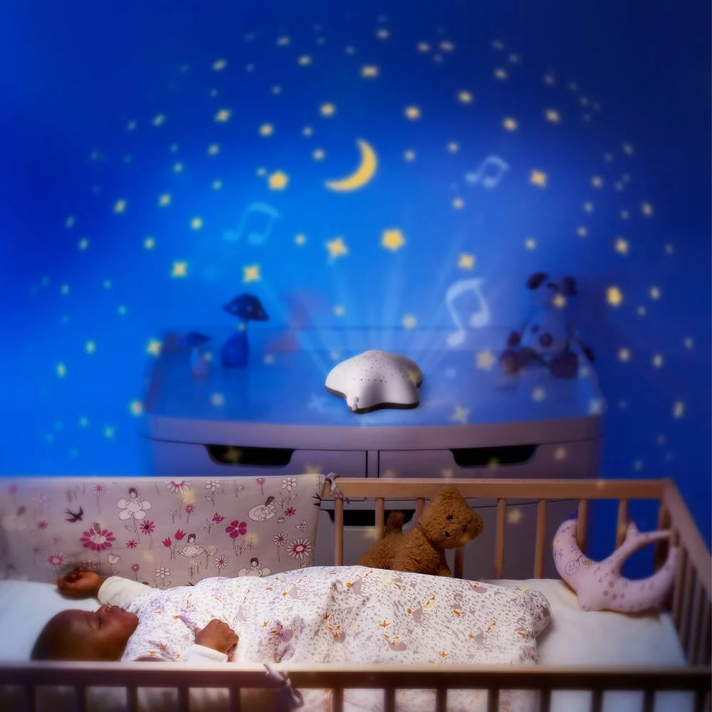 PROJECTEUR MUSICAL D'ETOILES BEIGE DANS LES BOIS