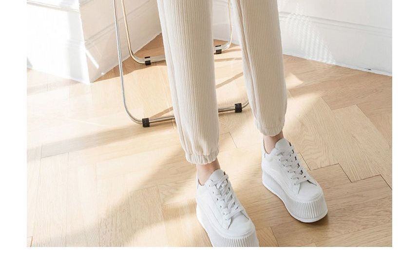 CRIBI - Hoge taille effen geribbelde fleece-gevoerde joggingbroek