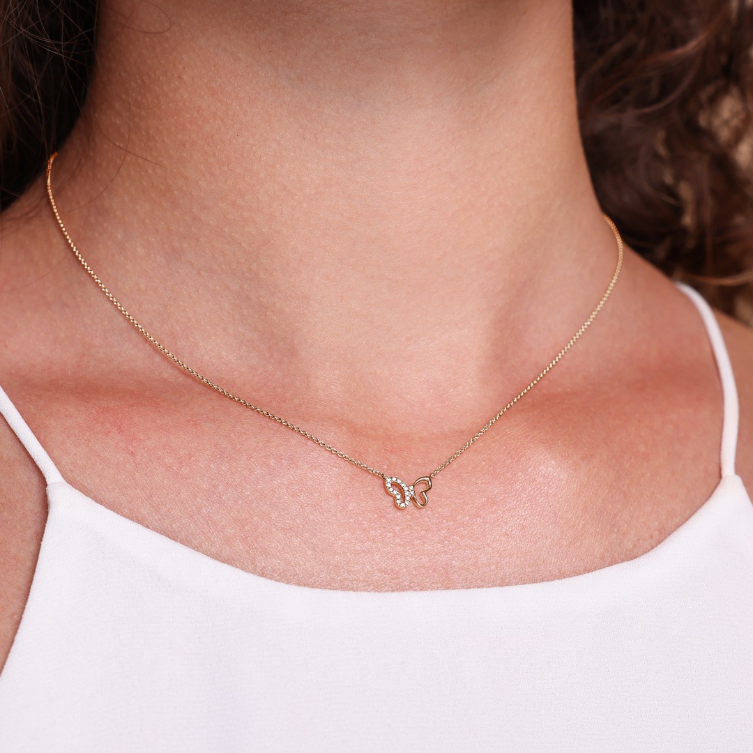 Collier 750/18 K Roségold Schmetterling mit Diamanten 0.04 ct H/si