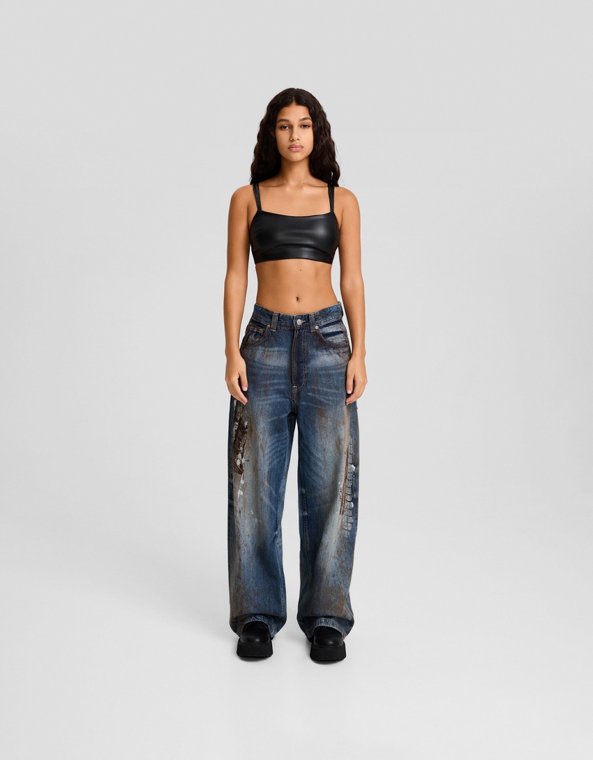 Calça jeans super larga com estampa de respingos de tinta