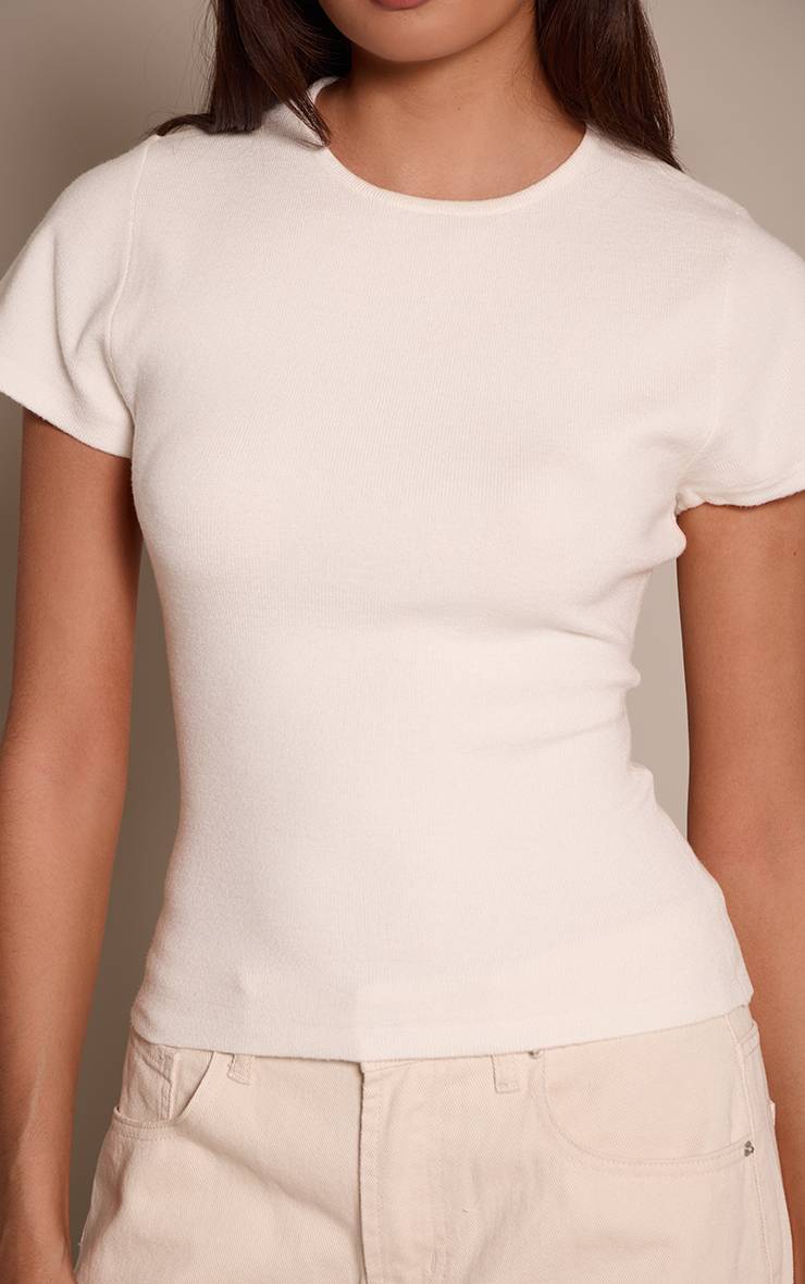 Crème T-shirt Ajusté En Maille Avec Taille Cintrée