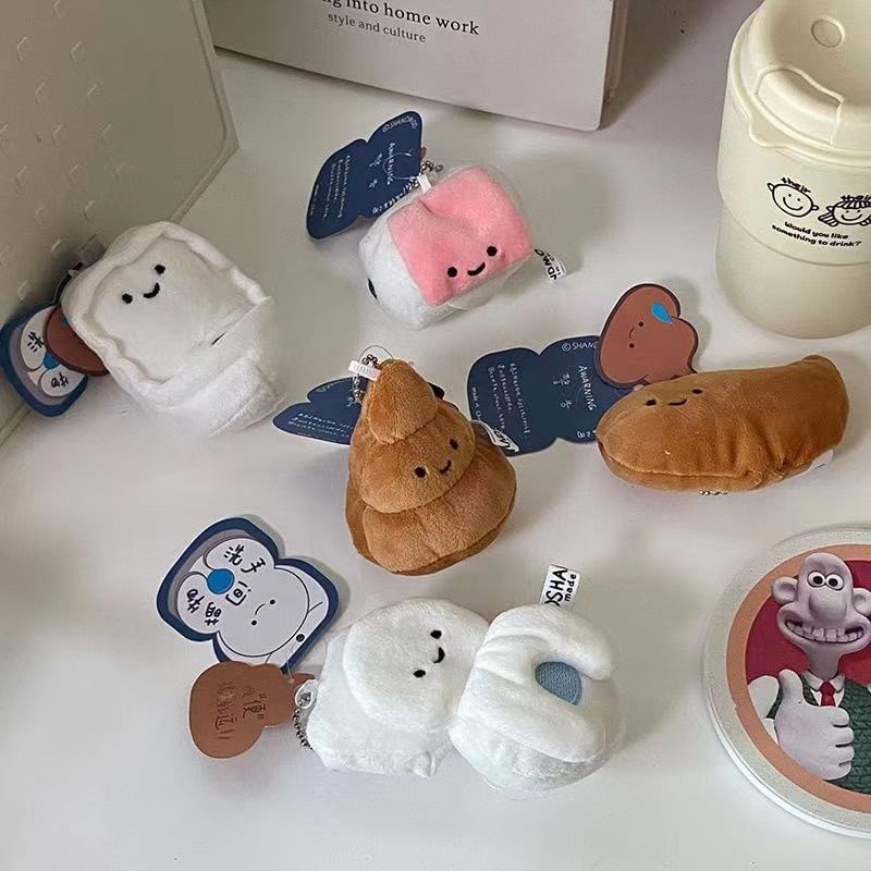 Coolkiss - Toilettas-bedel sleutelhanger (verschillende ontwerpen)