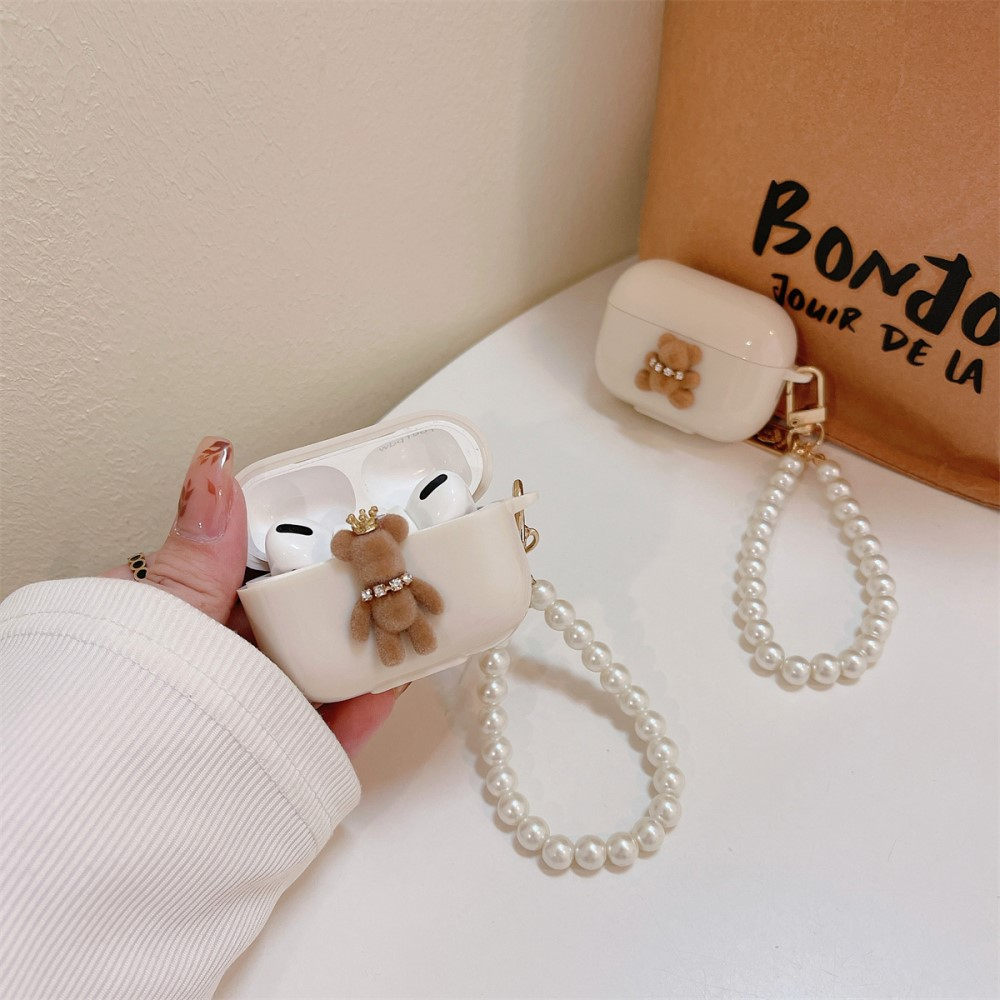 AirPods Pro 2 / AirPods Pro / AirPods Pro Gummi Case Schutzhülle mit Handschlaufe Bär mit Krone Design - Beige