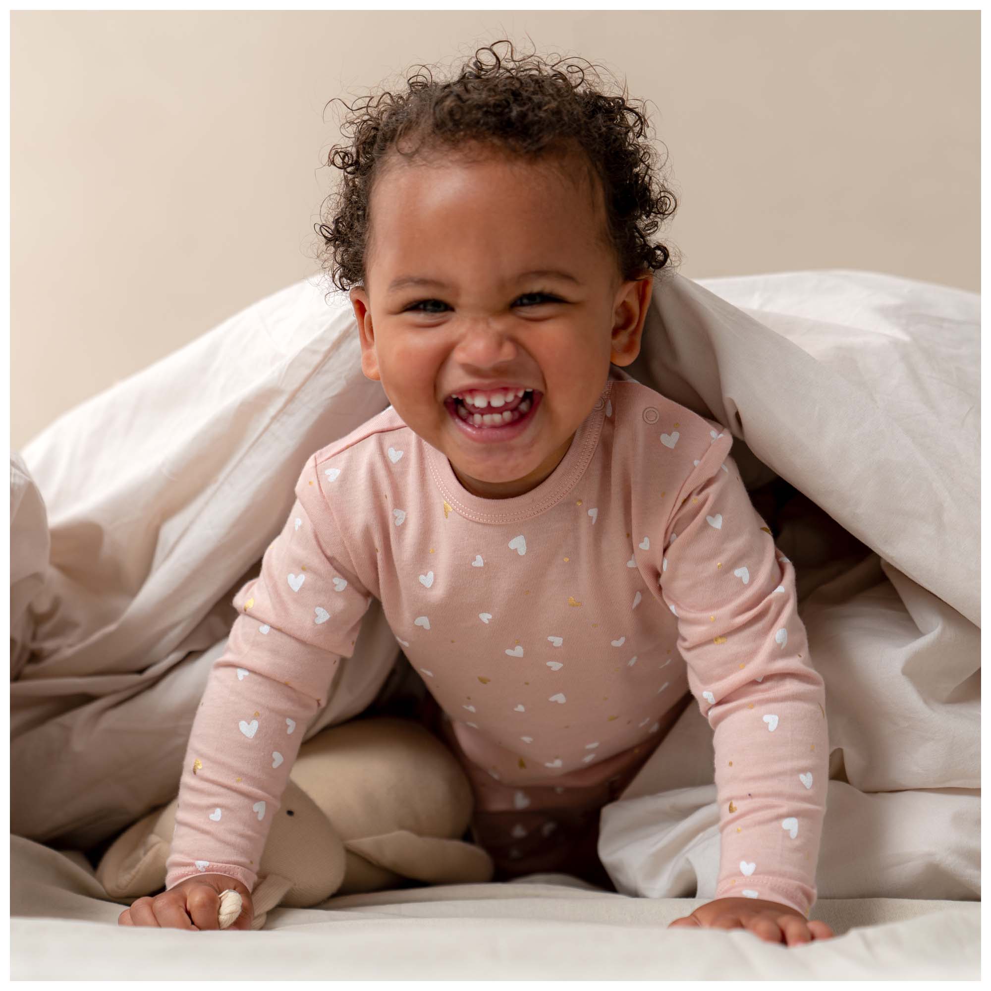 Prénatal peuter pyjama hartjes roze