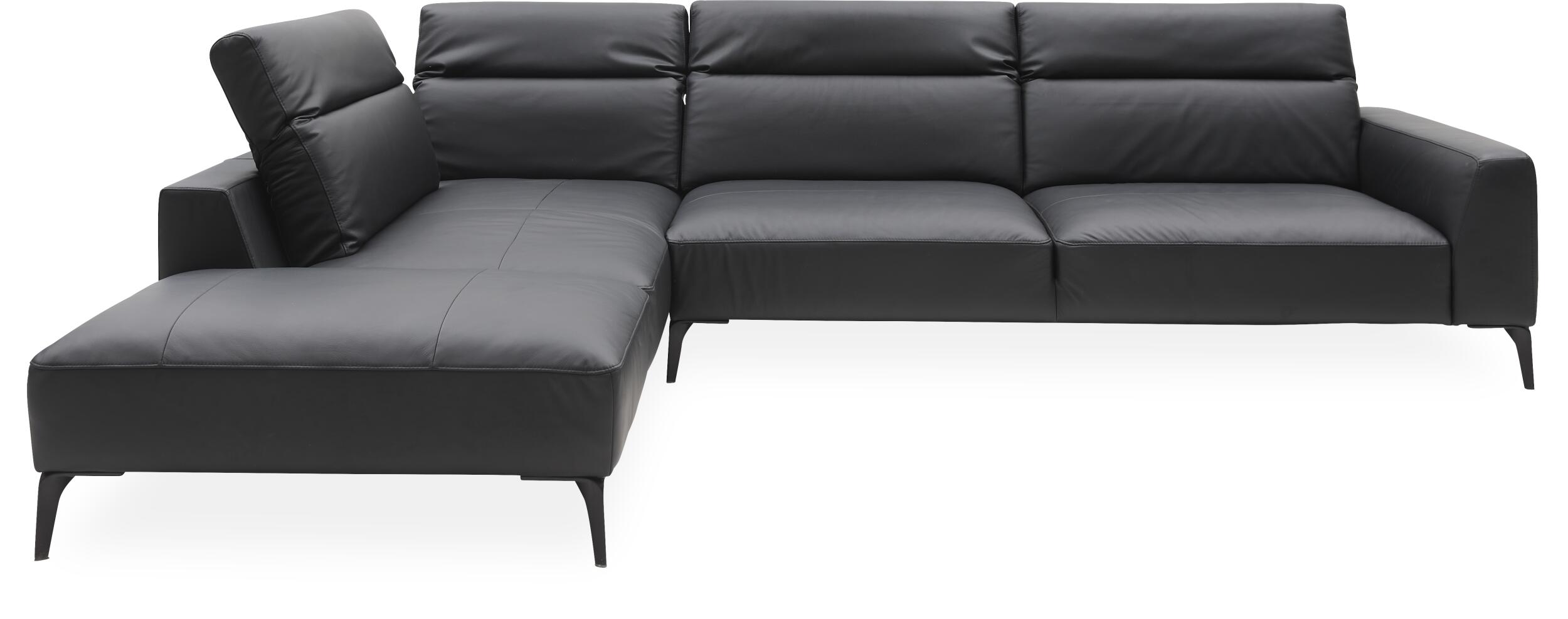 Volanti venstrevendt sofa med pufafslutning