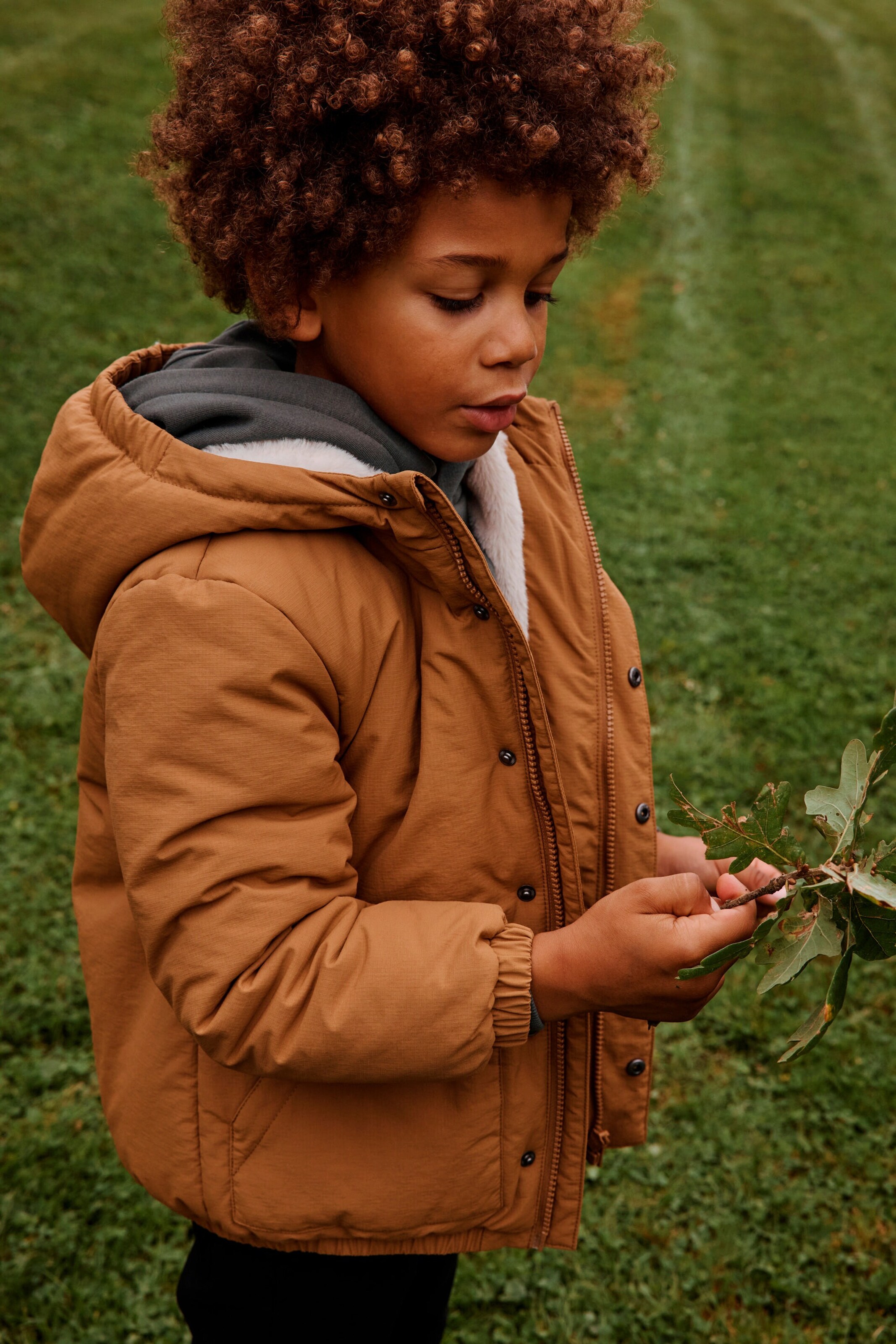 Vertbaudet Jungen Winterjacke mit Kapuze und Webpelzfutter, Recycling-Polyester bronze