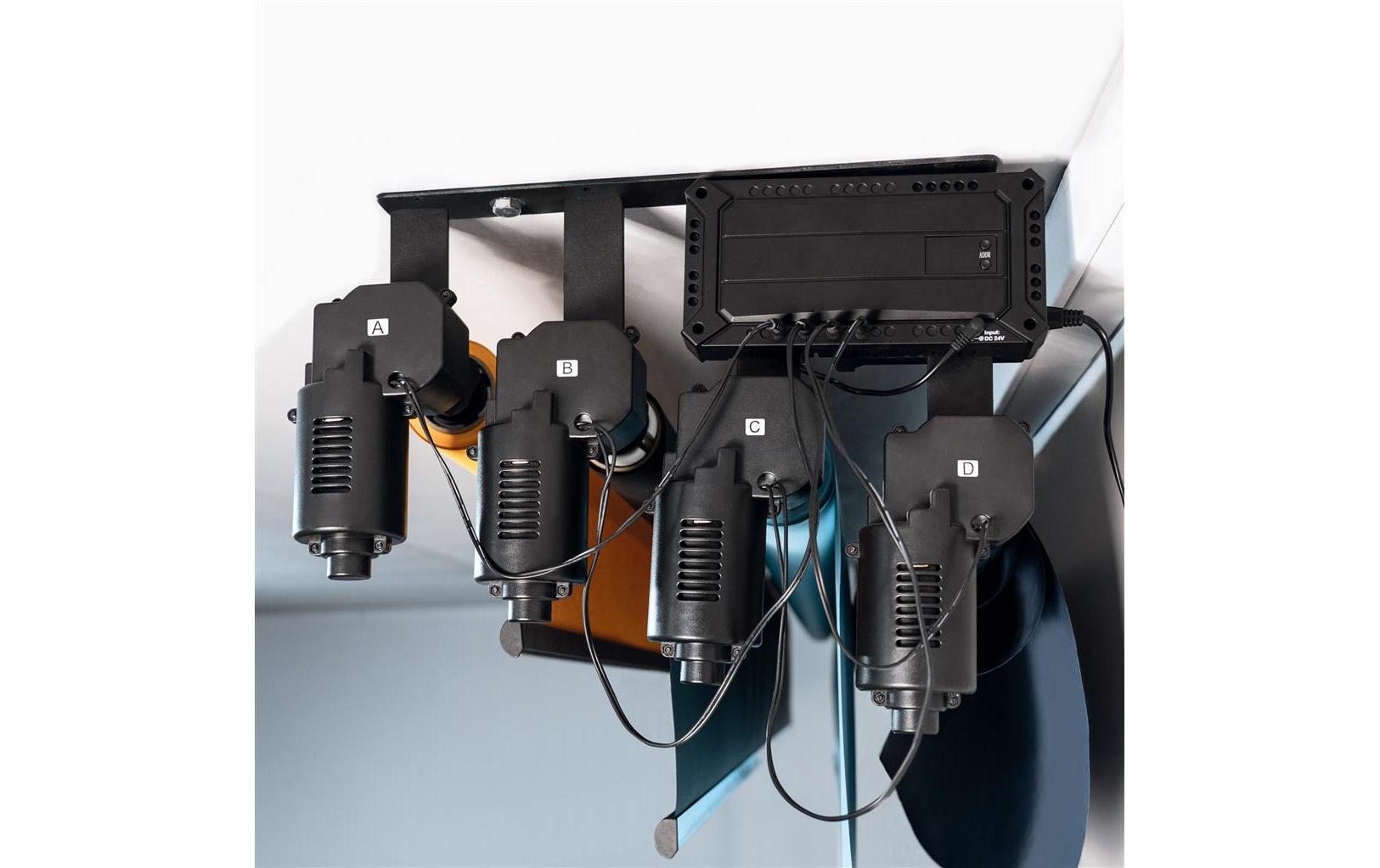 Aufhängung Funk Motor für 4 Papierhintergründe<br>Motorisierte Rollenaufhängung zum Auf- und Abrollen von bis zu 4 Papierhintergründen