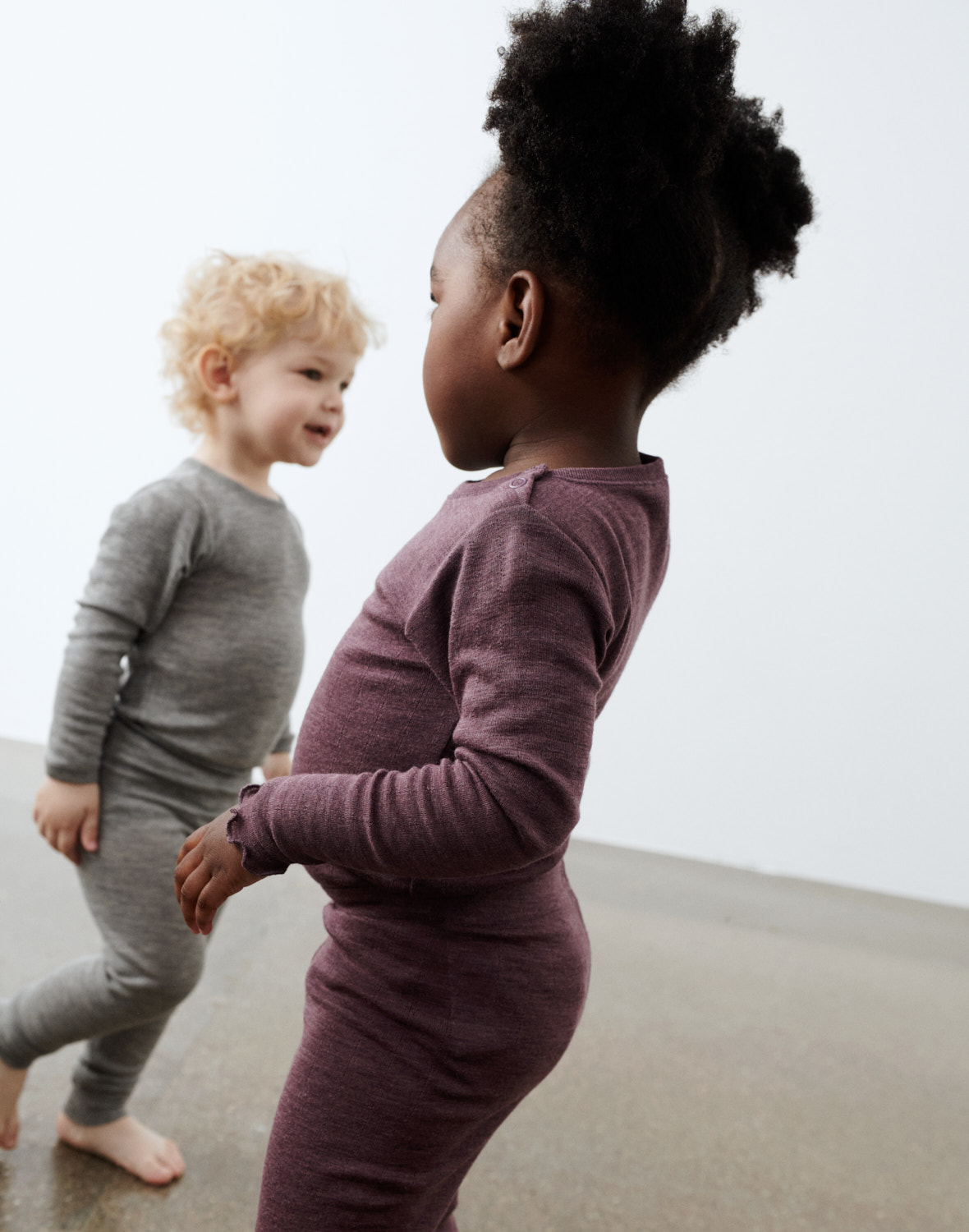 Pointelle romper met lange mouw van merinowol/zijde voor baby's