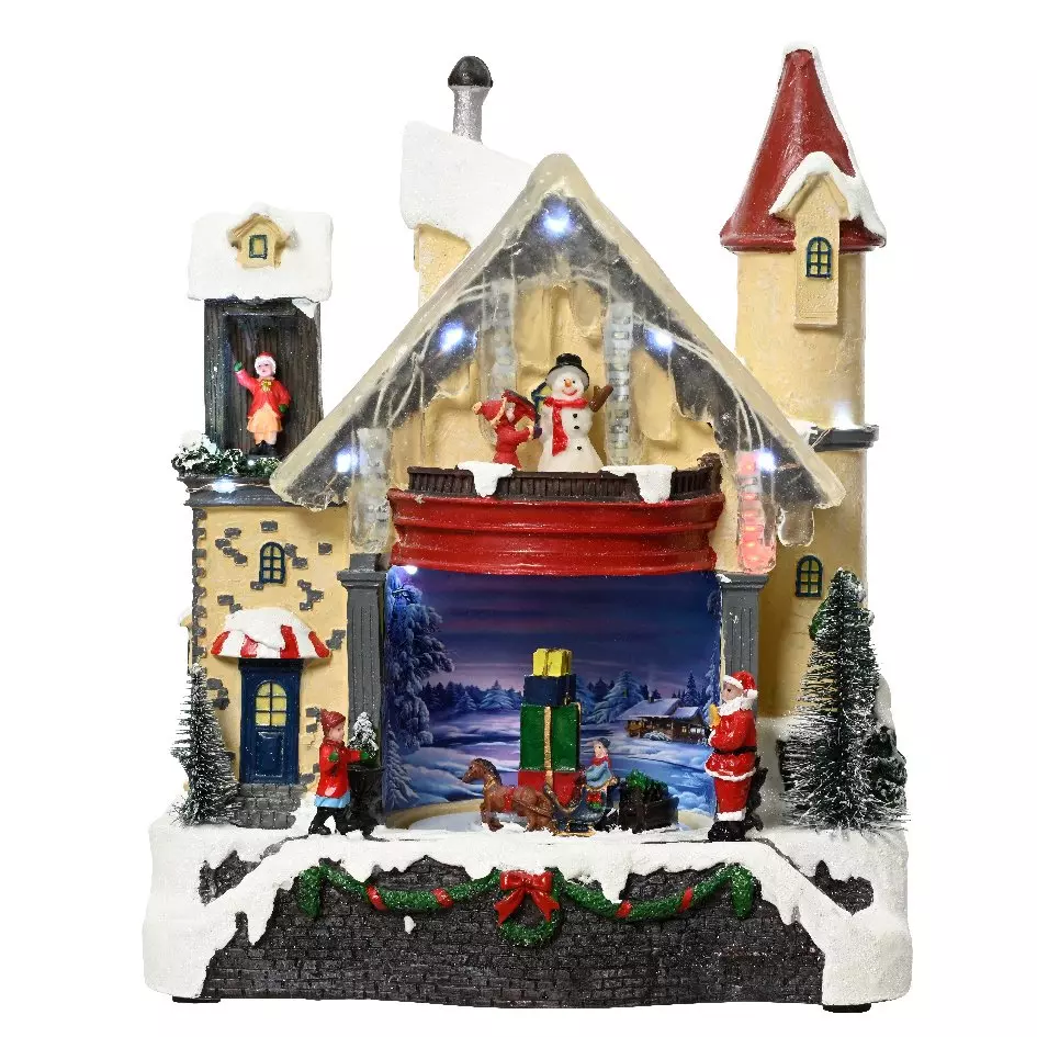 Maison du bonhomme de neige enneigée et illuminée à piles