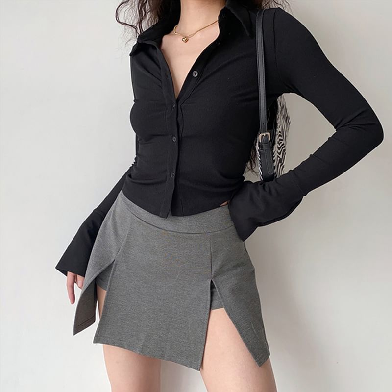 Rosesand - Effen geribbeld, slim-fit crop top met klokmouwen
