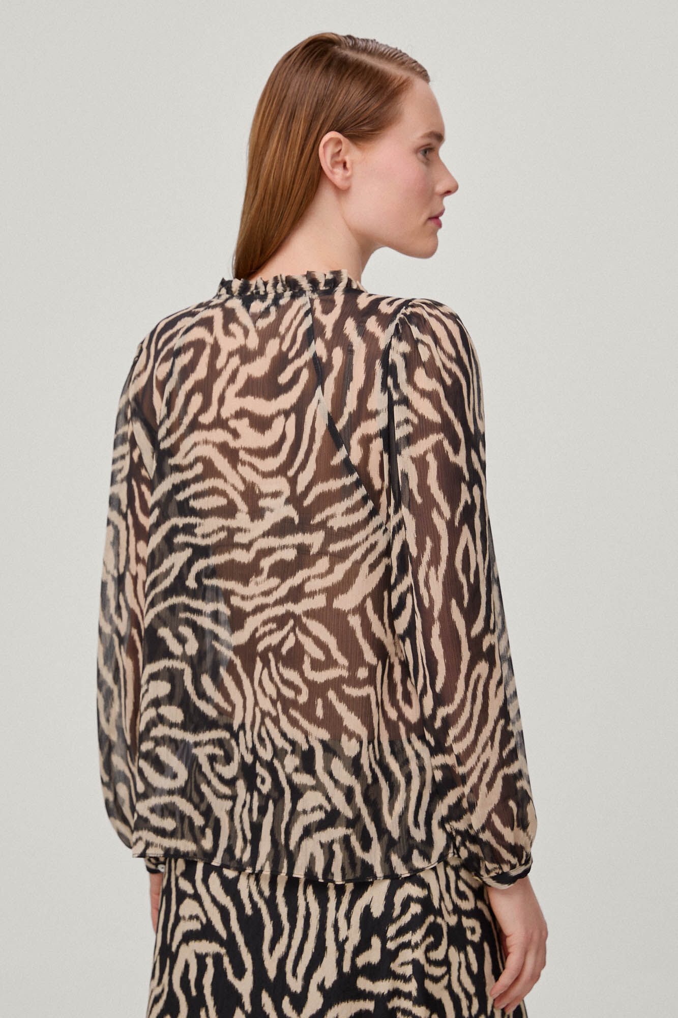Blusa estampada - Preta
