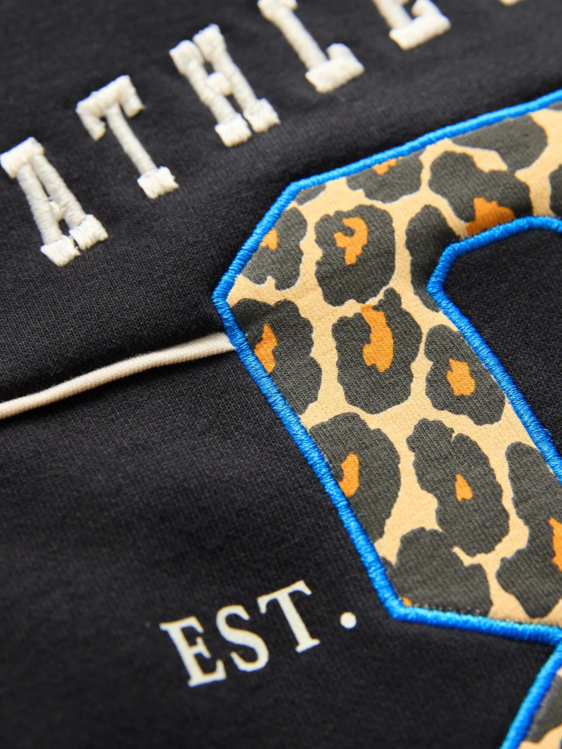 Zwart met dierenprint - Sweatshirt met slogan (3 - 16 jr)