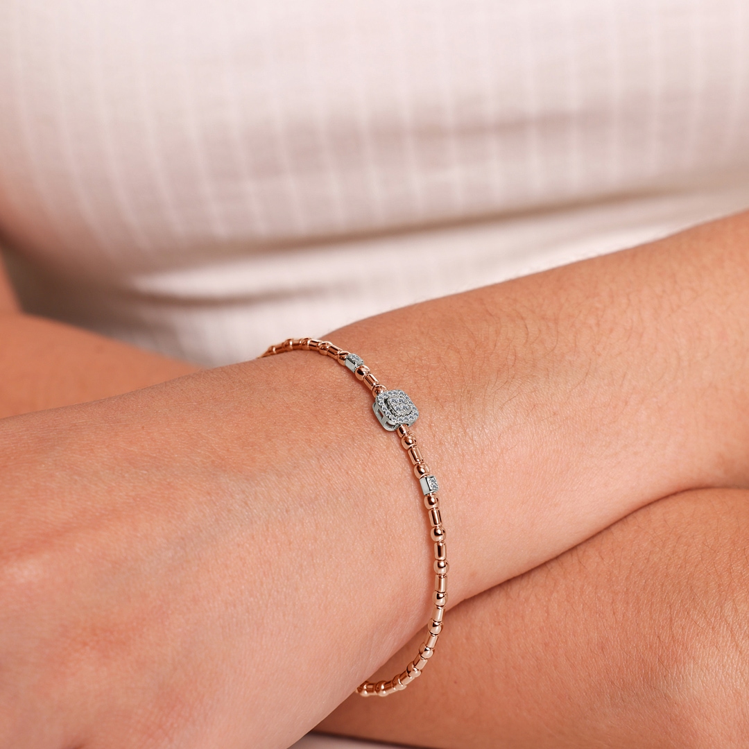Armreif 750/18 K Rosé-/ Weissgold mit Diamanten 0.12 ct H/si