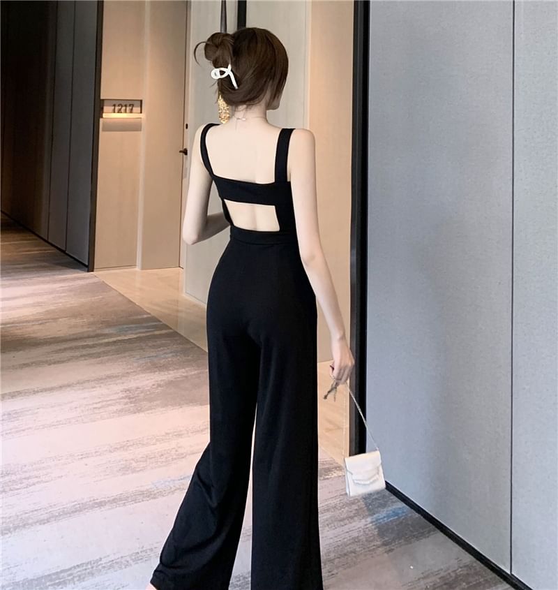Magma - Mouwloze jumpsuit met open rug en wijde pijpen