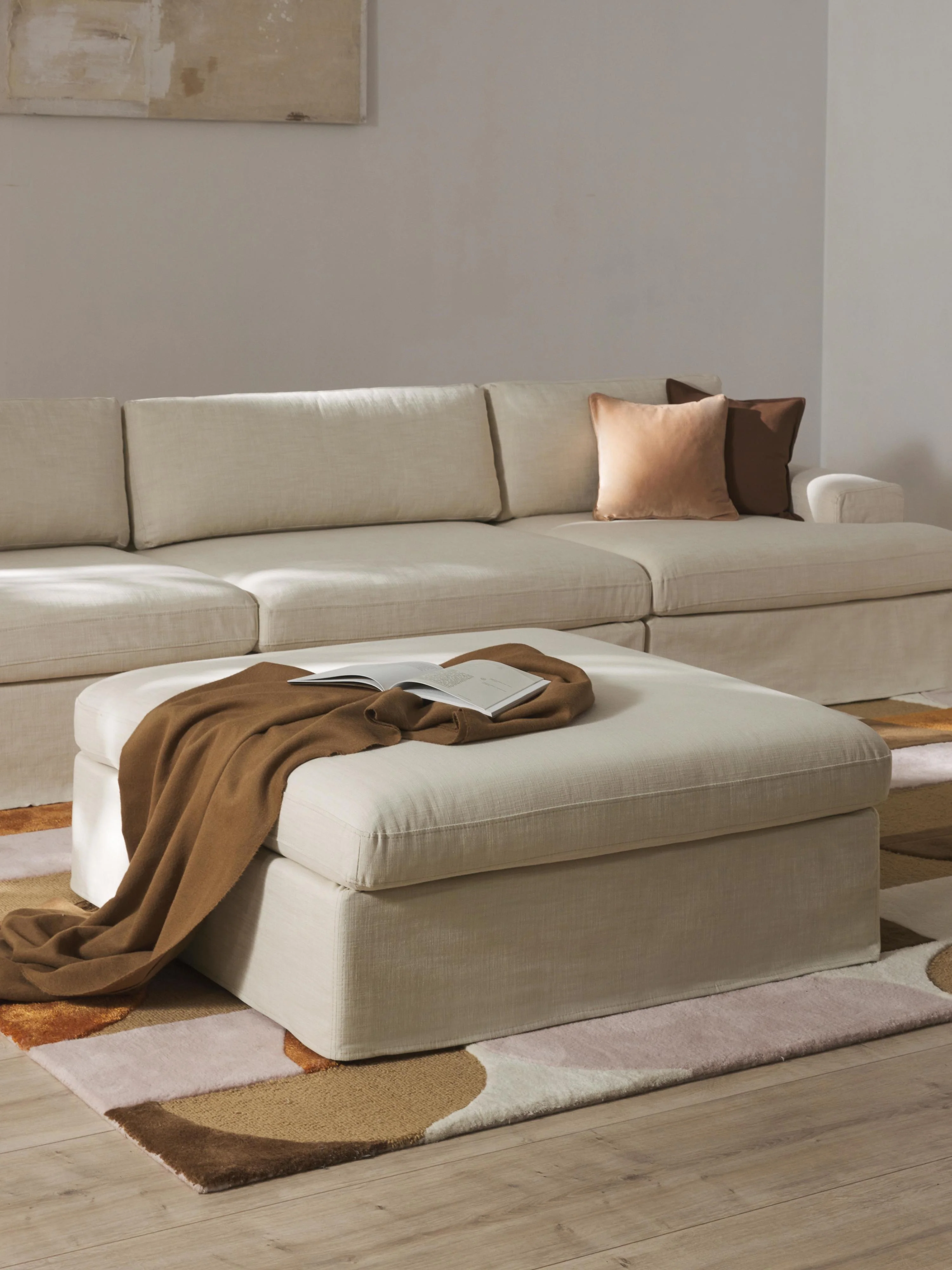 Modulaire bank Russell (4-zits) met poef (links/rechts)
