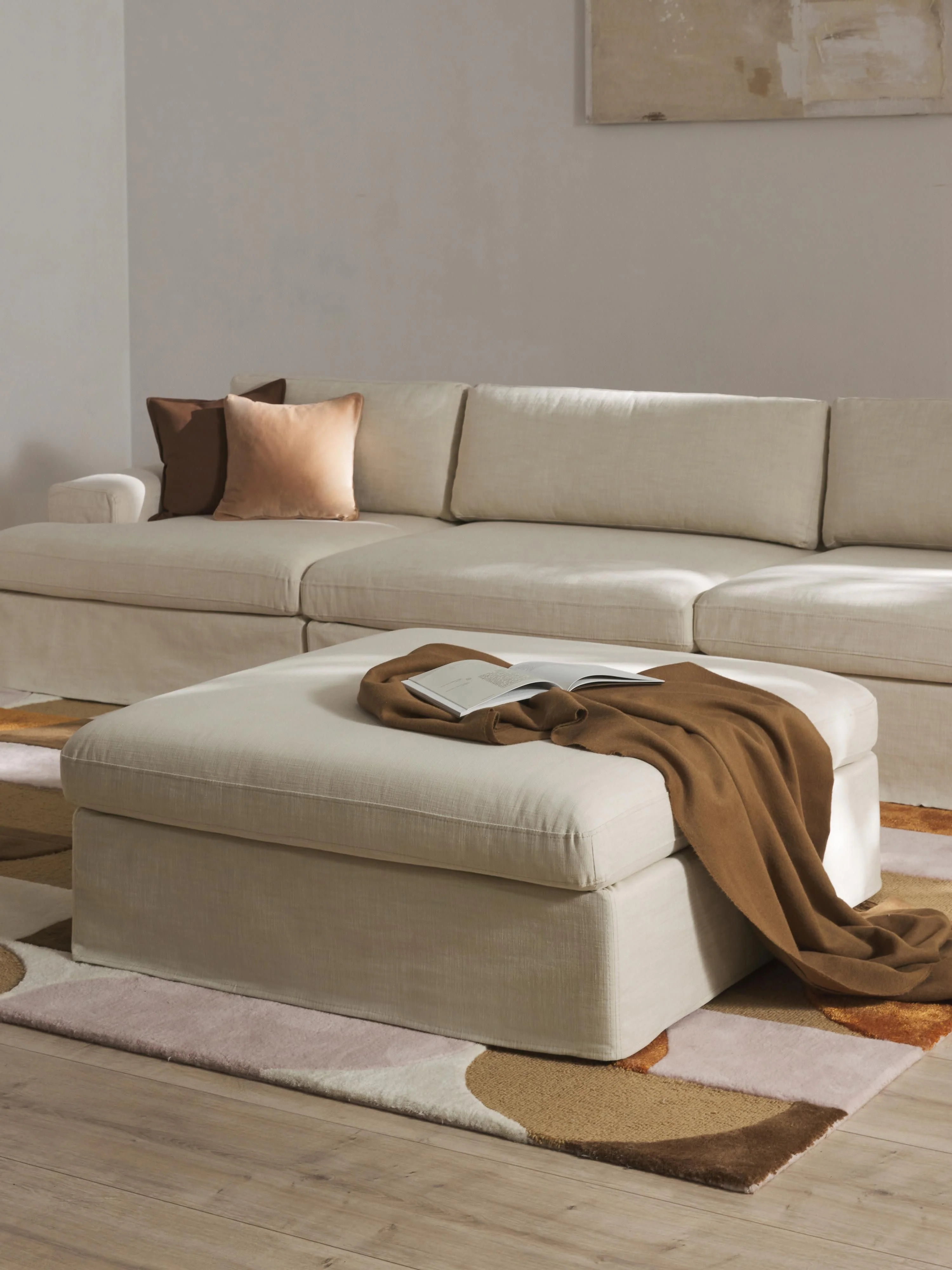 Modulaire bank Russell (4-zits) met poef (links/rechts)