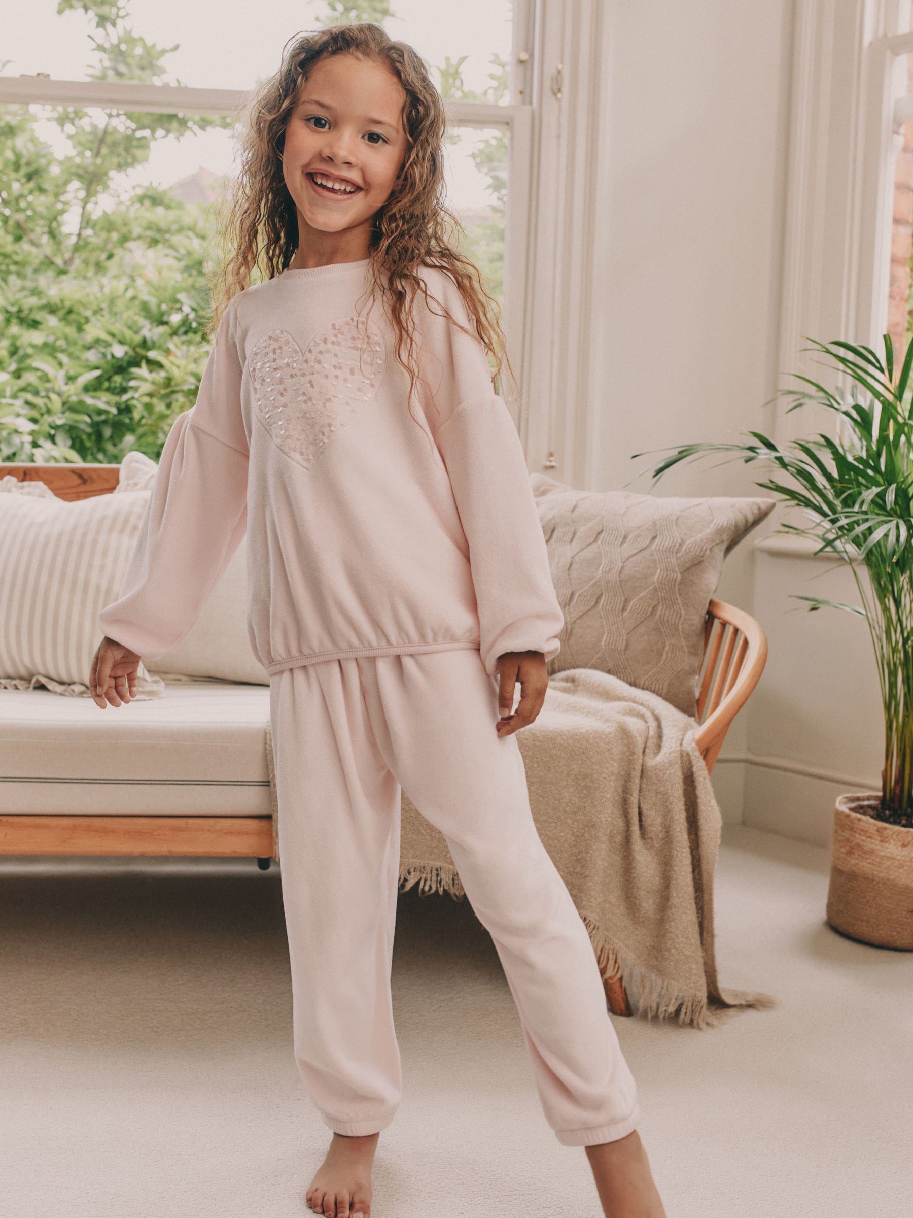 Roze met hart van lovertjes - Behaaglijke fleece pyjama (9 mnd-16 jr)