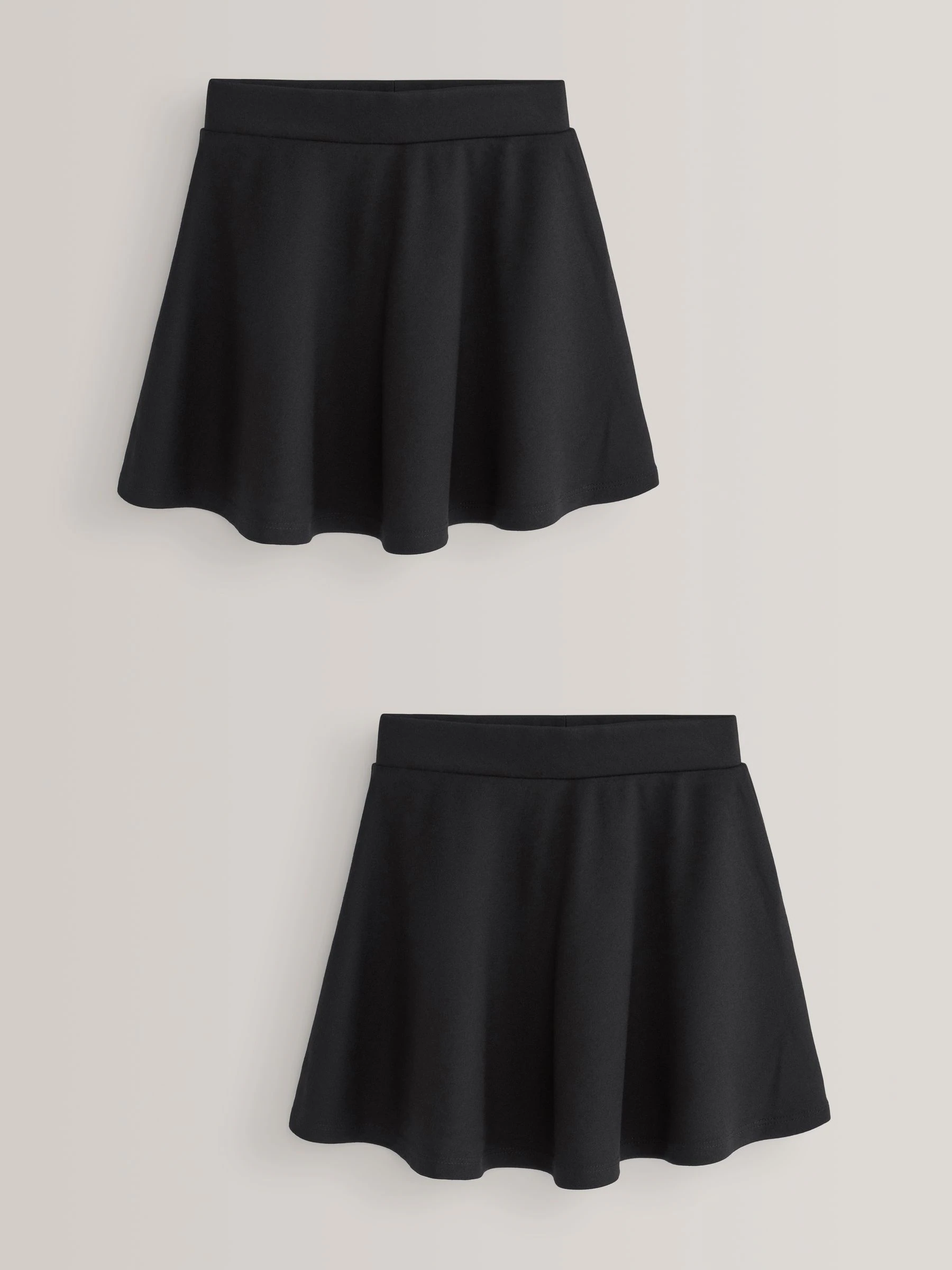 Zwart - 2 Pack stretchy jersey schoolskaterrokken met elastische taille (3-17jr)