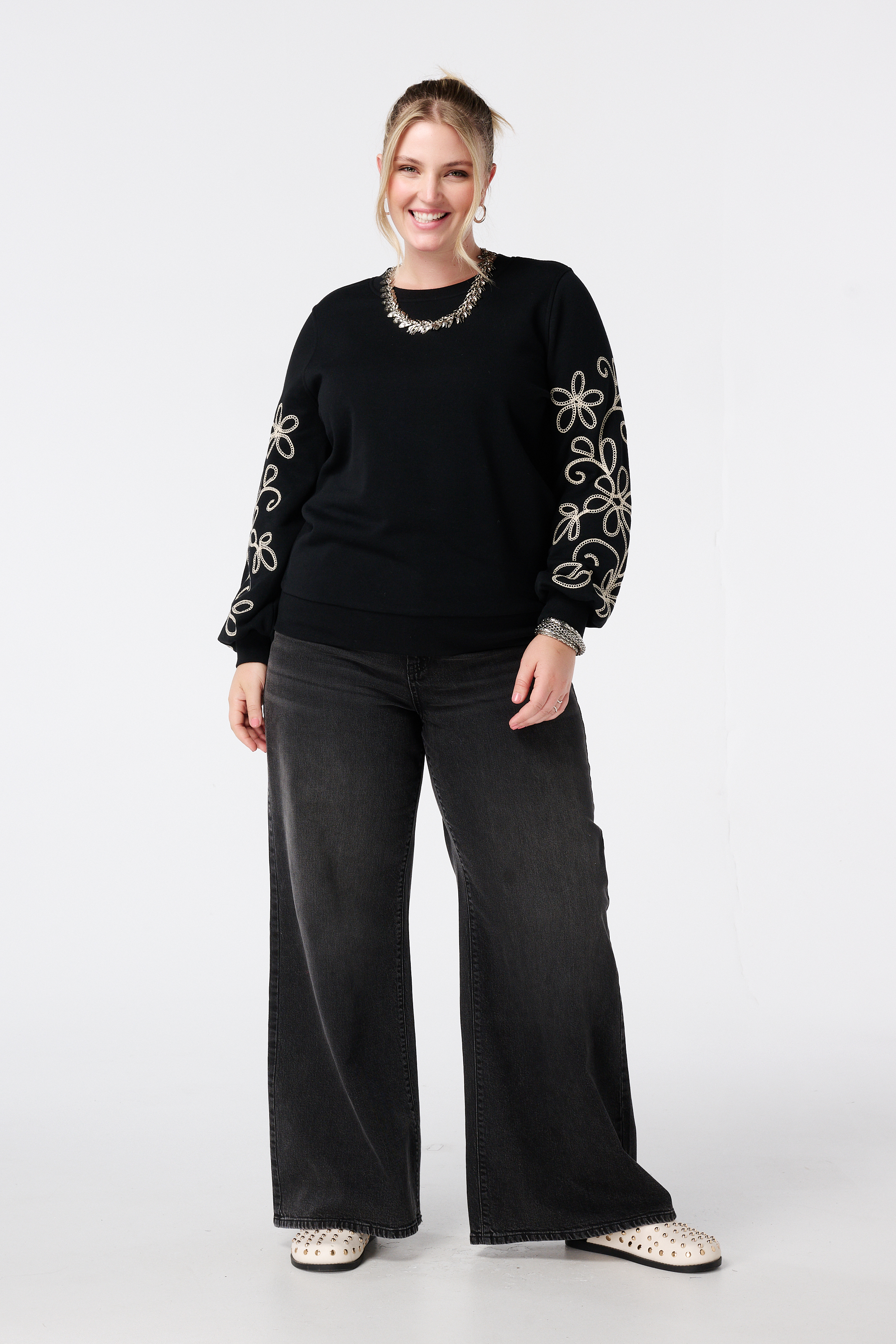 Sweater met broderie details Zwart