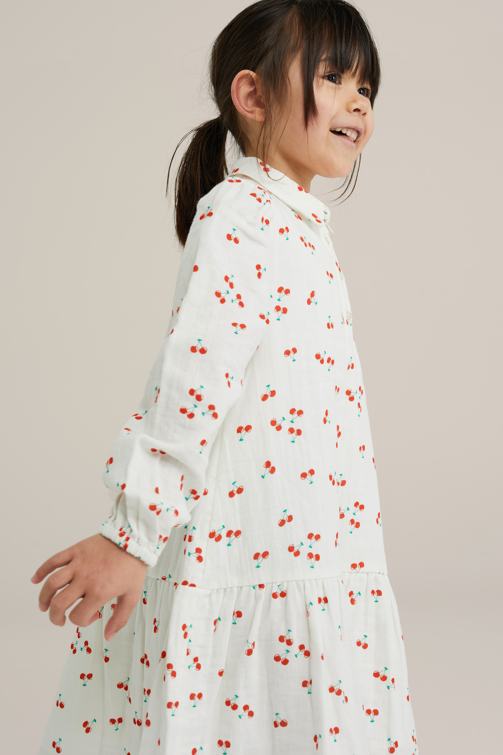 Meisjes jurk met dessin WE Fashion Gebroken wit