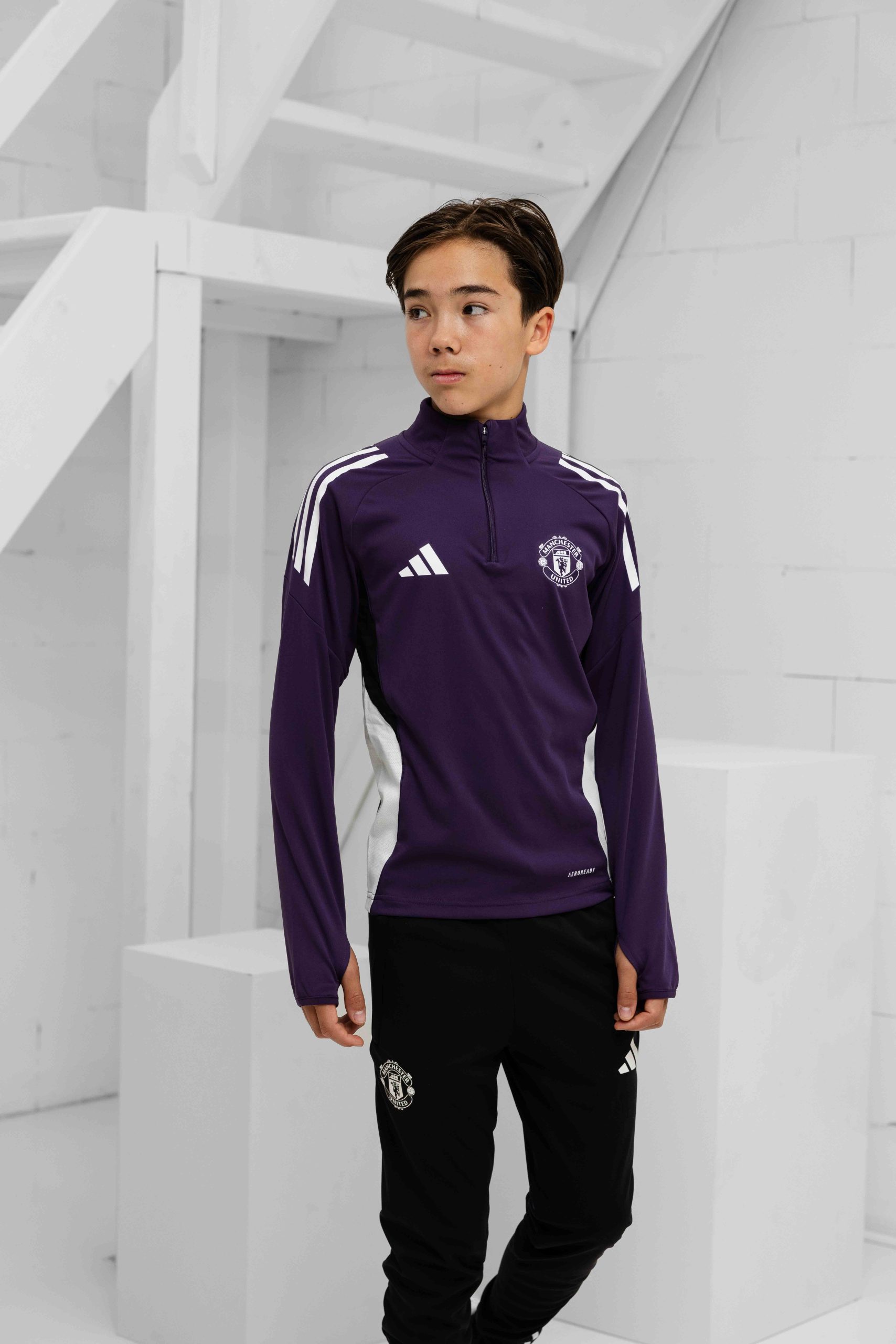 Manchester United 1/4 Zip Trainingspak Junior 2025/2026