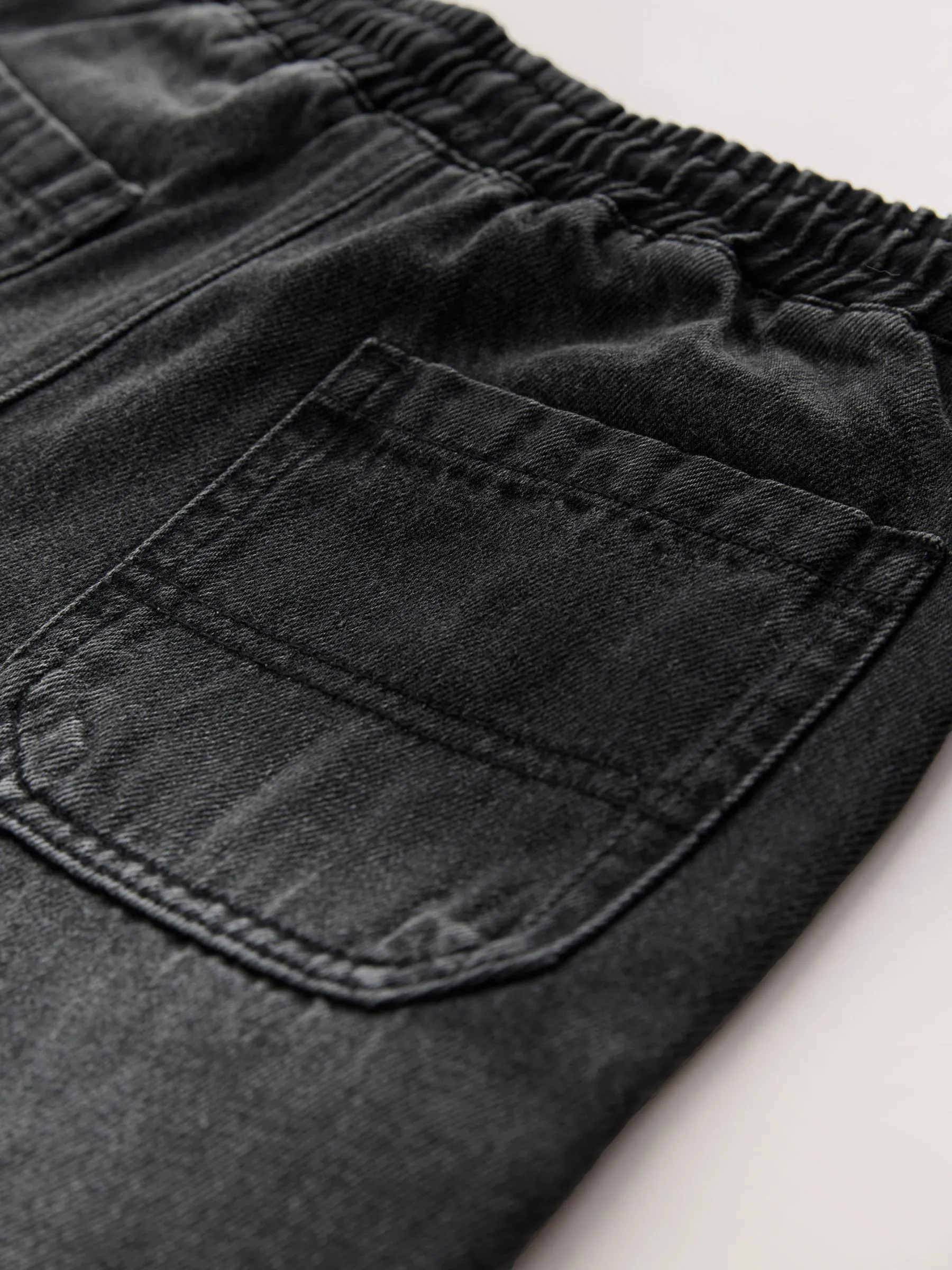Zwarte wassing - Denim jeans met elastische taille (3-16jr)