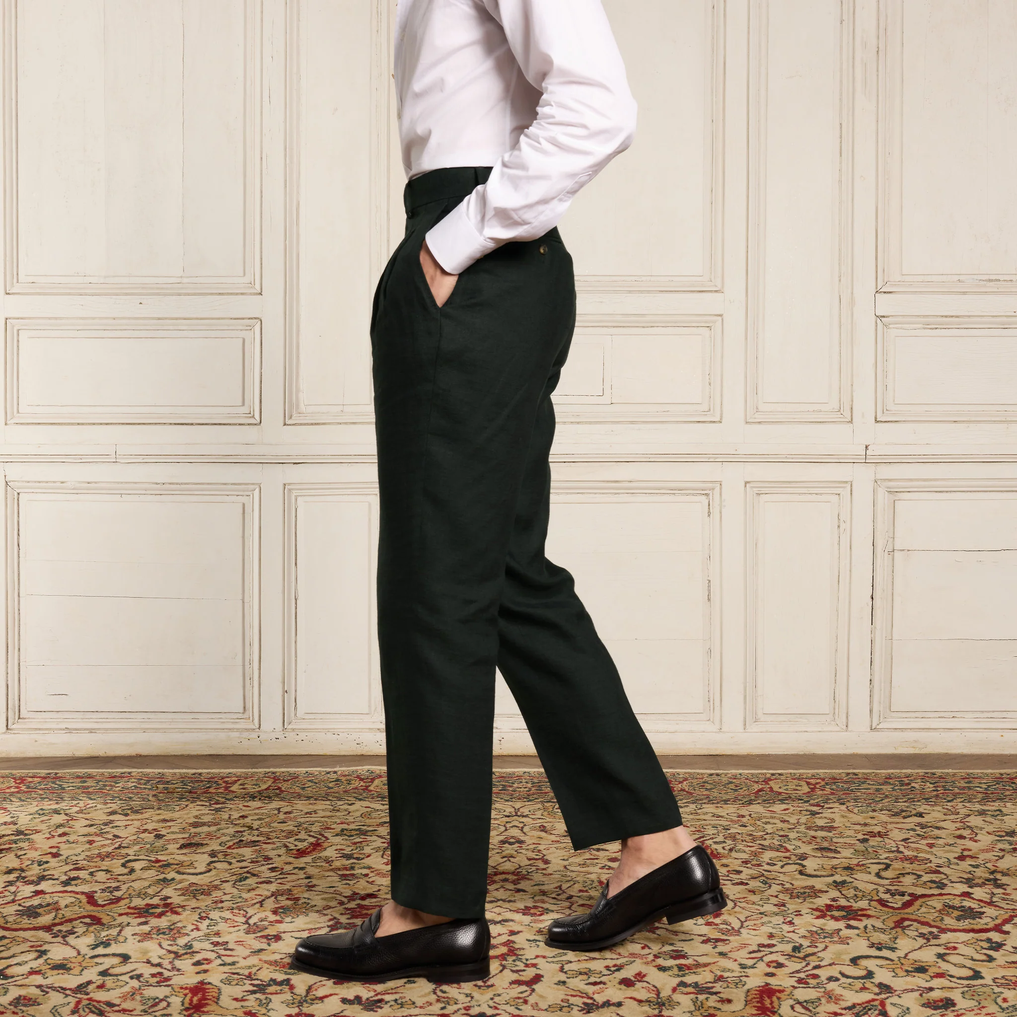 Double-pleated green linen pants