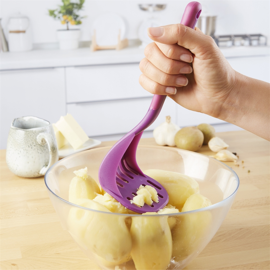 Presse purée coude
