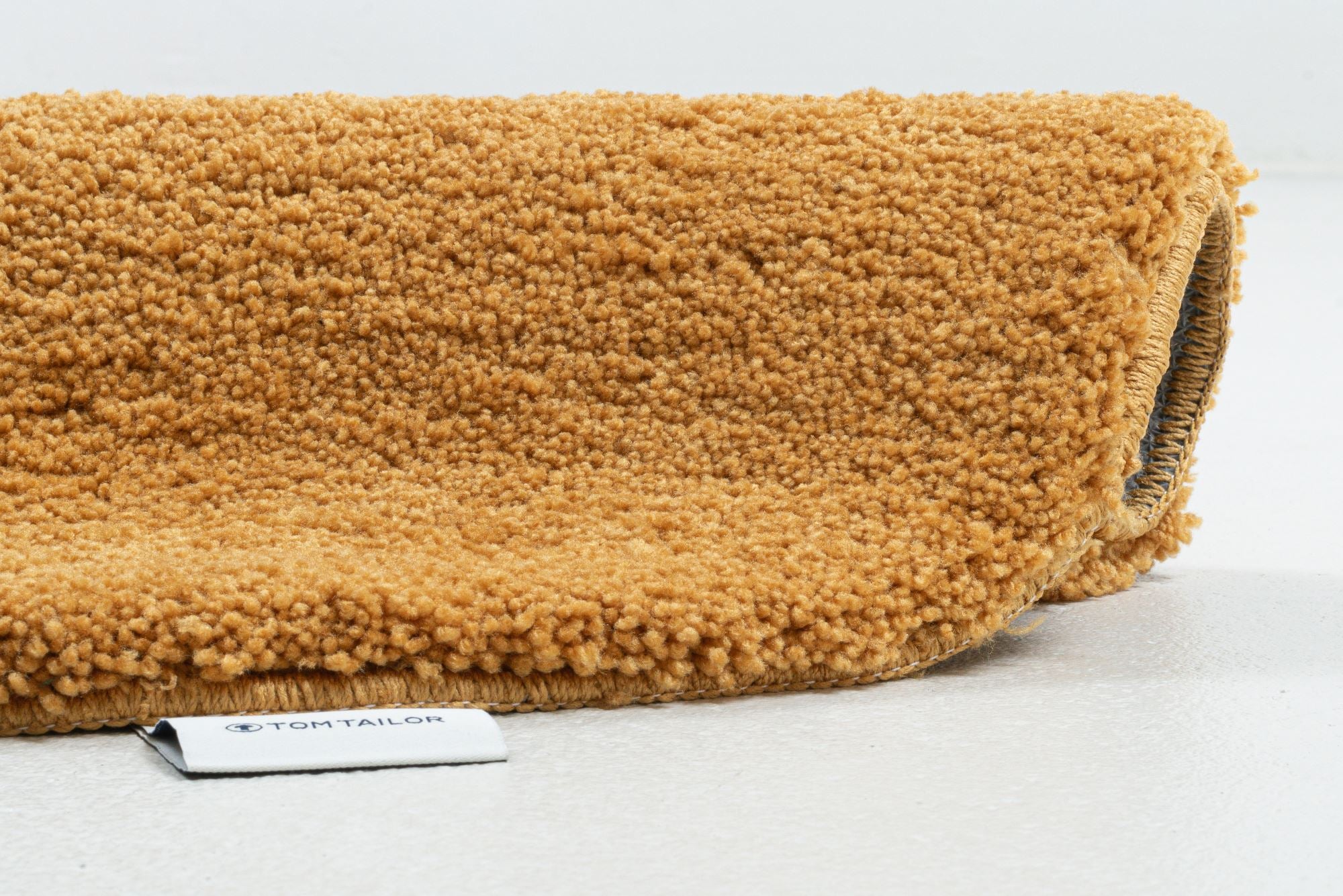 Tom Tailor Cozy Bath Badmat Ã 60 cm - Goud