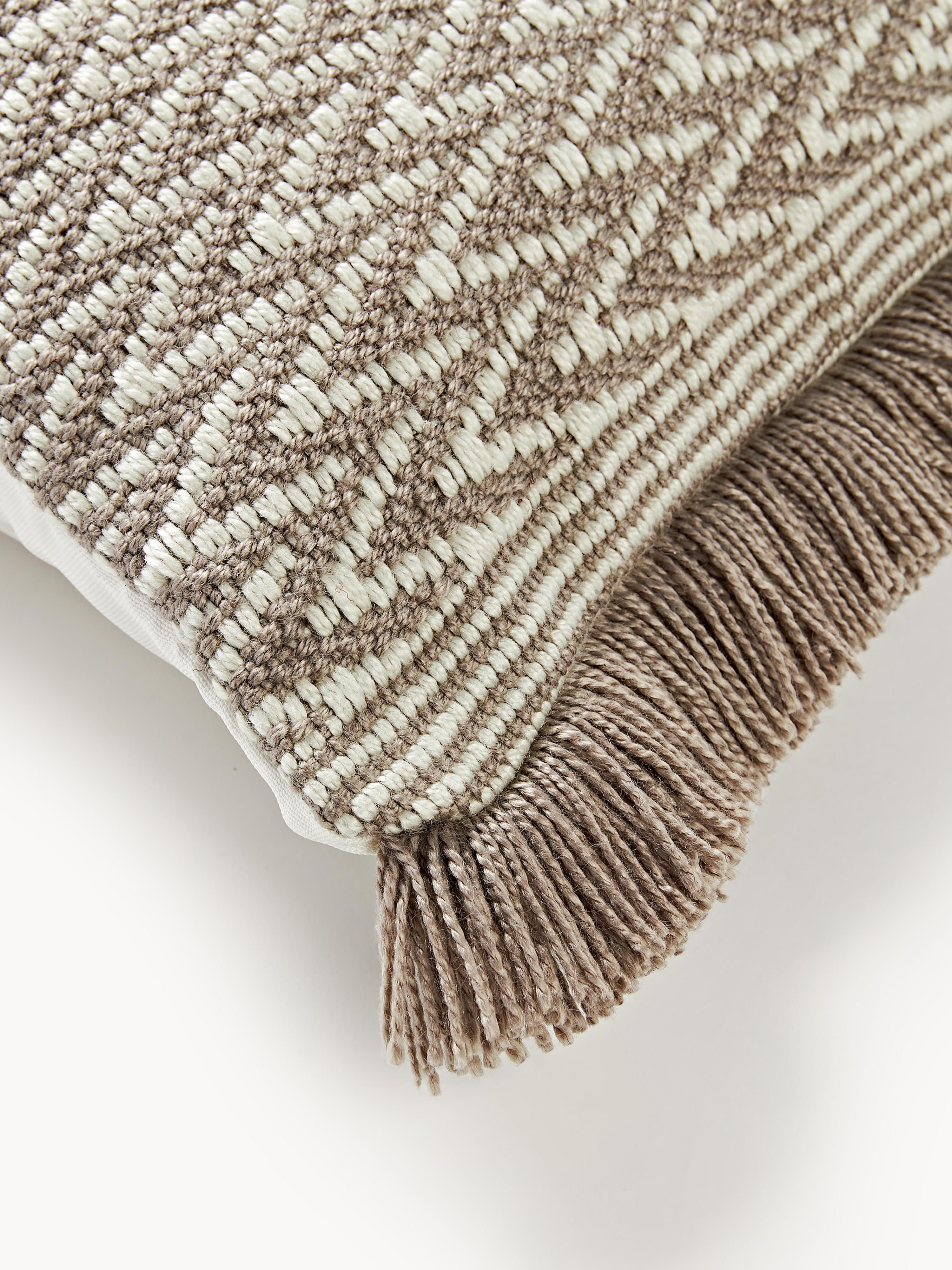 Outdoor kussenhoes Suria met geweven patroon en franjes
