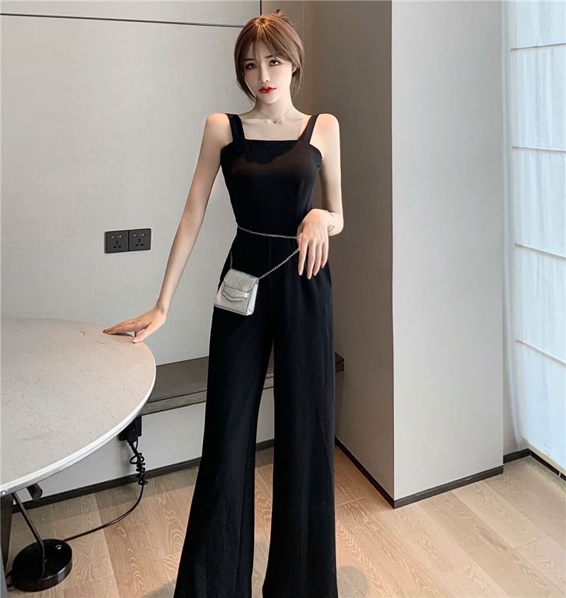 Magma - Mouwloze jumpsuit met open rug en wijde pijpen