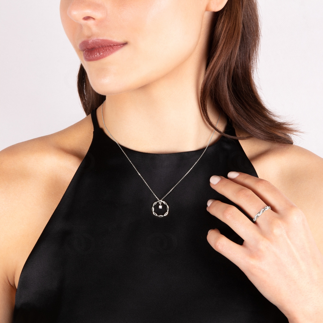 Collier mit Anhänger 750/18 K Weissgold mit Diamant 0.09 ct H/si