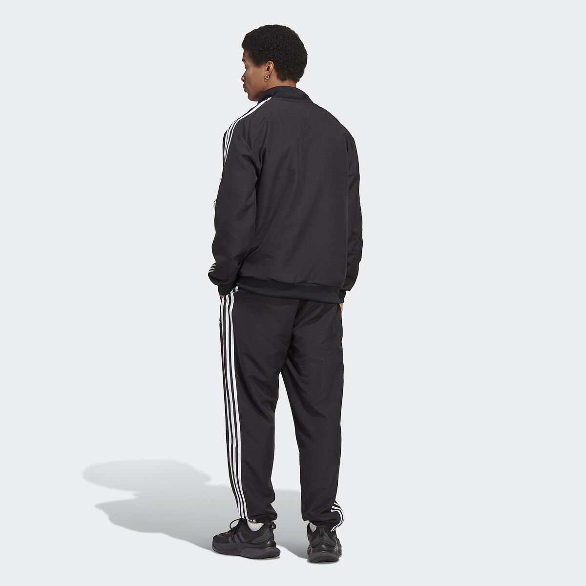 ADIDAS ROUPAS ESPORTIVAS<br>Conjunto de treino em tecido com 3 listras