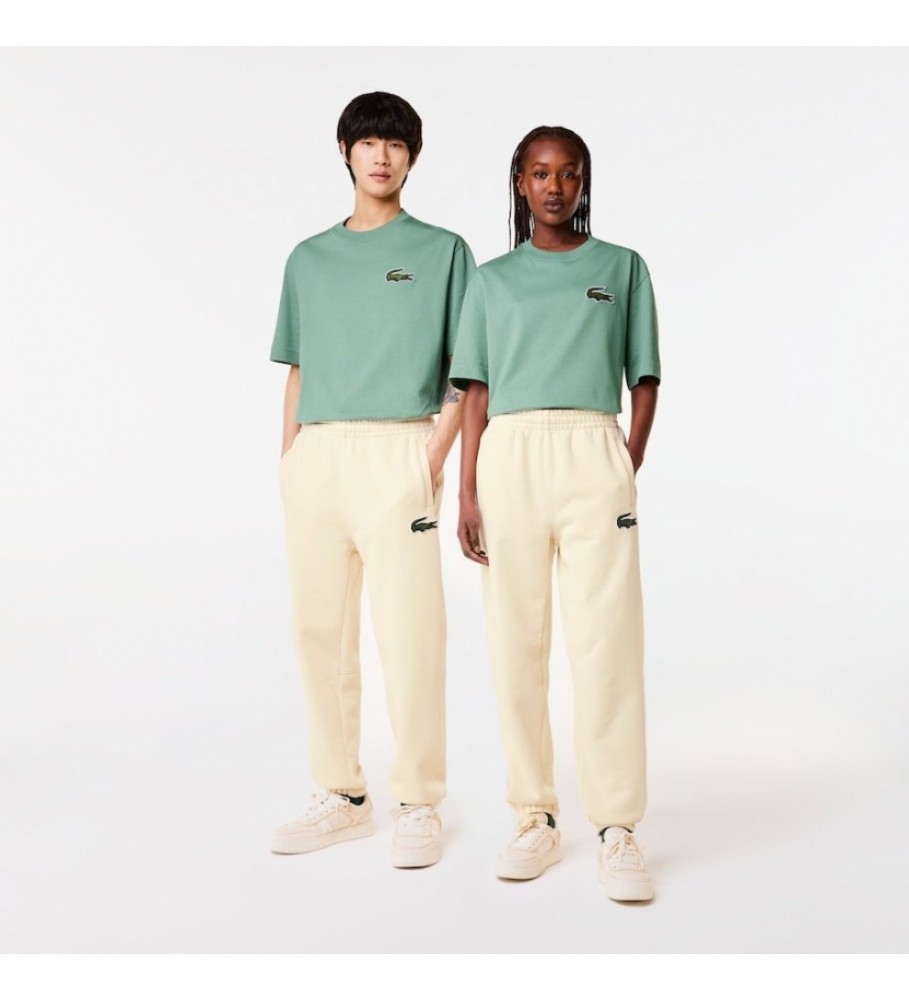 Calça de treino Lacoste unissex em fleece bege.