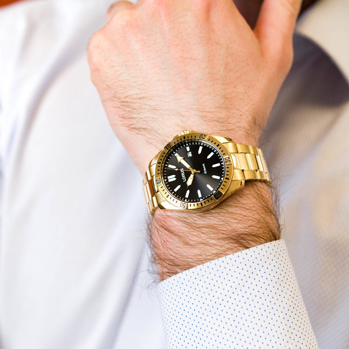 Montre Lorus noire et dorée dateur