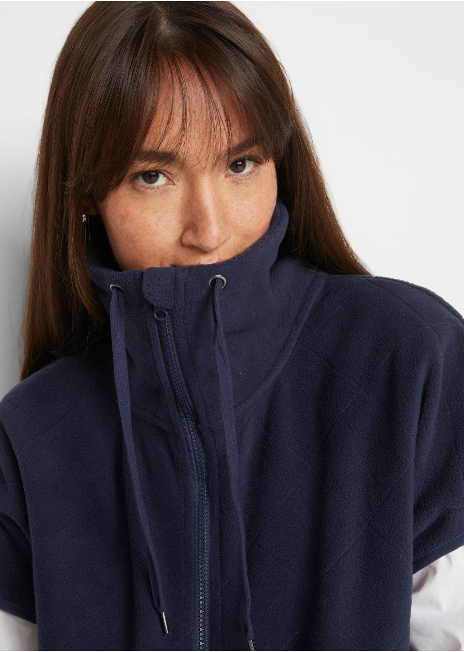 Gilet sans manches en polaire avec surpiqure losange en polyester recyclé