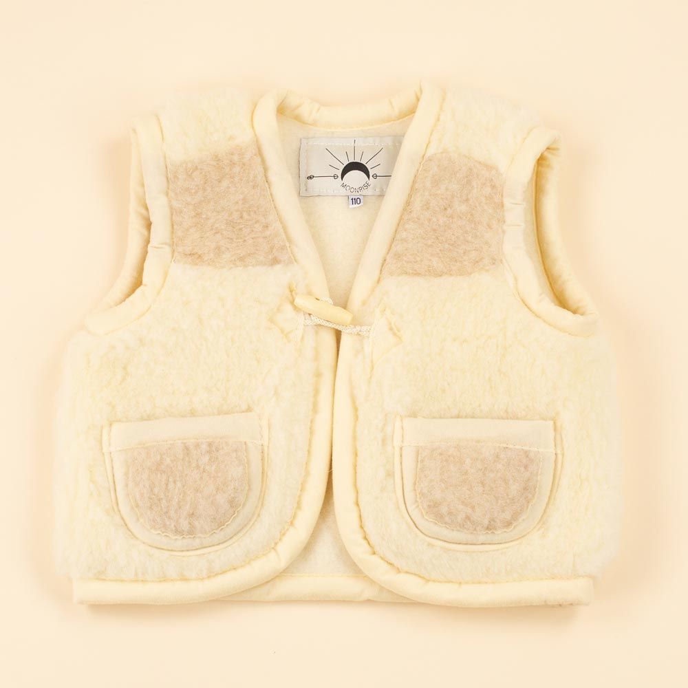 Moonrise kids wollen bodywarmer Danica beige met knoopje