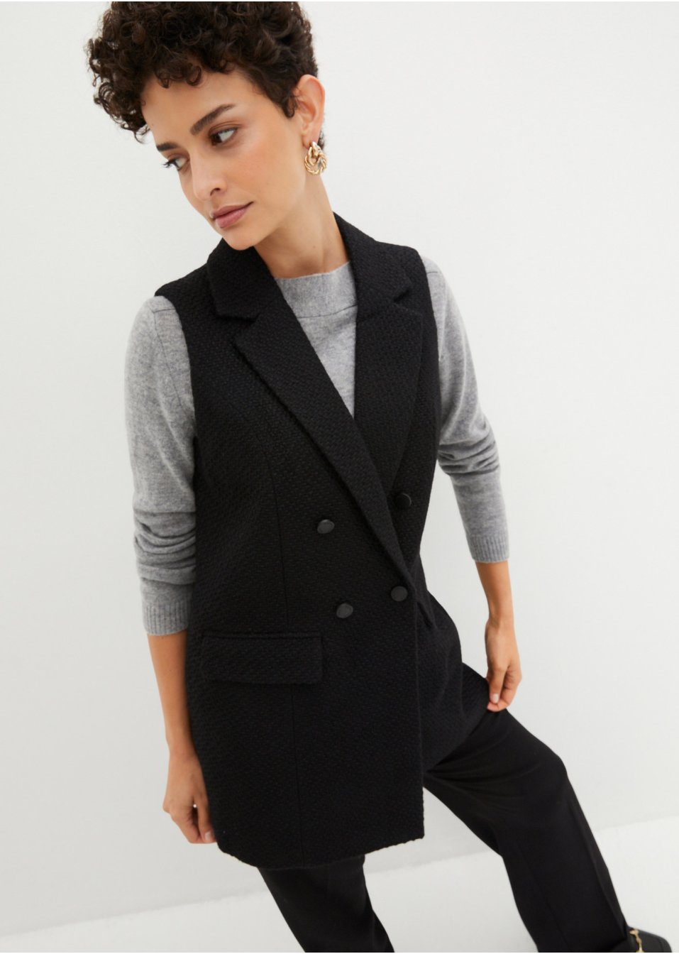 Gilet sans manches long en bouclé brillant